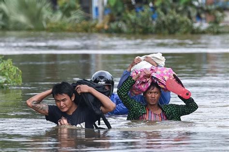 Tens of thousands flee homes in flood-hit Myanmar - Myanmar Water Portal