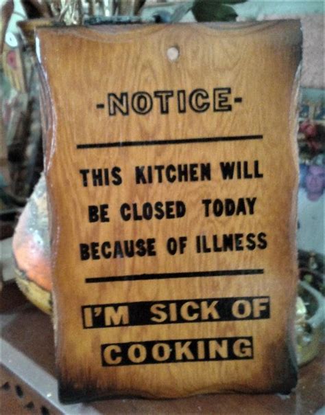 a wooden sign that says notice this kitchen will be closed today ...