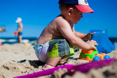 Free Images : man, beach, sea, sand, play, boy, vacation, color, child, blue, children, colors ...