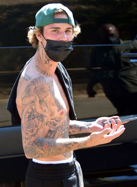 Justin Bieber Shares the Meaning Behind His Tattoos | Us Weekly