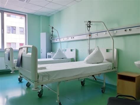 Two Hospital Beds on Wheels in a Hospital Bed on Windows Backgraund Stock Image - Image of ...