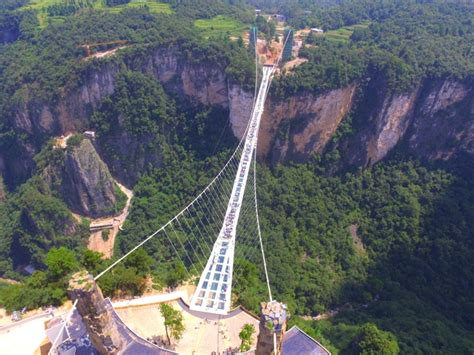 Glass bridge at a gorge in Zhangjiajie Hunan Province China - Photorator