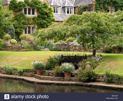 Old English Manor House with lake and gardens, Coton Manor Gardens ...