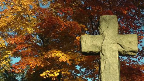 closeup cross gravestone beautiful fall foliage Stock Footage Video (100% Royalty-free) 1815596 ...