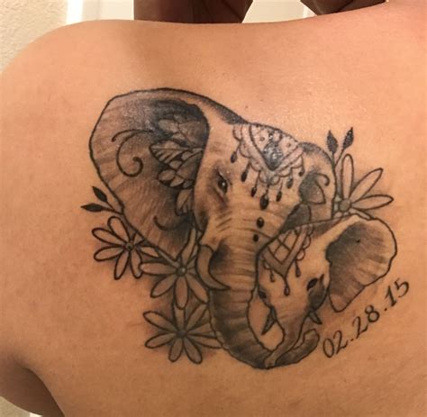 Mama and baby elephant tattoo with my daughter’s birthday. I had the ...