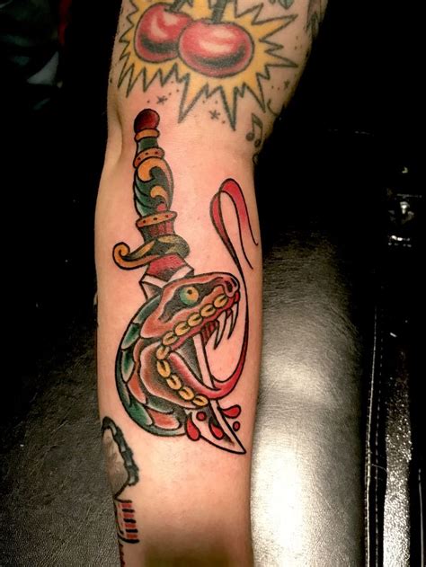 Traditional snake head knife tattoo | Trendy tattoos, Traditional tattoo, Tattoos