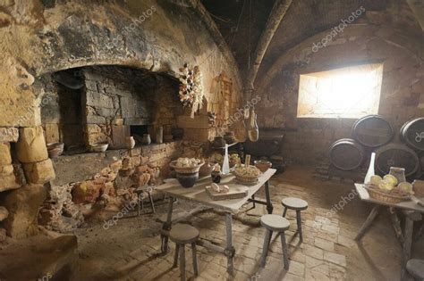 an old wine cellar with several tables and chairs in the room, all set up to look like it is ...