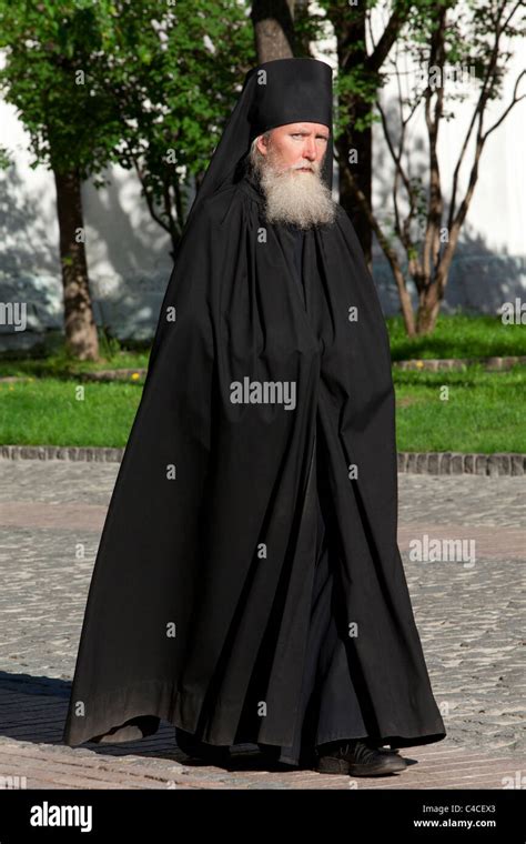 Russian Eastern Orthodox priest inside the Trinity Lavra of St. Sergius ...