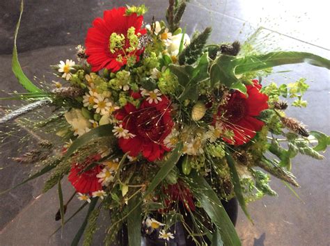 Lovely wild style bouquet with bright red mini gerbera Gerbera Bouquet, Bouquets, Wild Style ...