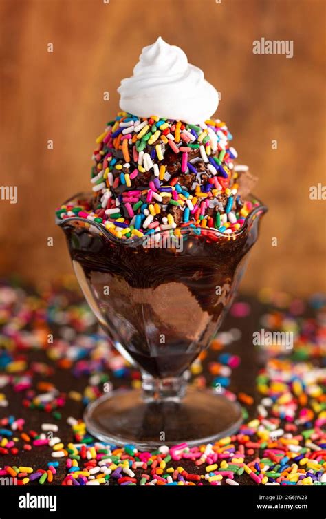 A Chocolate Ice Cream Sundae with Chocolate Syrup and Rainbow Sprinkles Stock Photo - Alamy