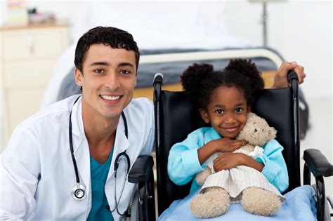 Doctor helping a sick child » Synergy Physicians » Engaged Physicians. Better Healthcare.