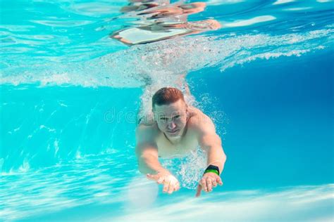 Man swimming underwater stock photo. Image of athlete - 183173666