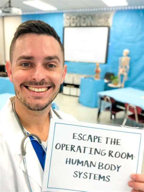 a man holding up a sign that says escape the operating room, human body systems