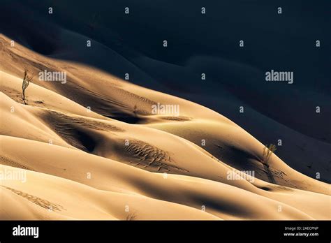 the shapes of sand dunes in lut desert Stock Photo - Alamy