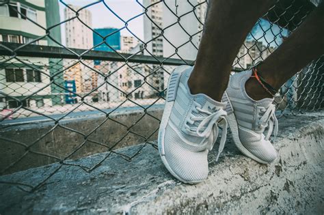 Man in Black White Nike Shoes during Nighttime · Free Stock Photo