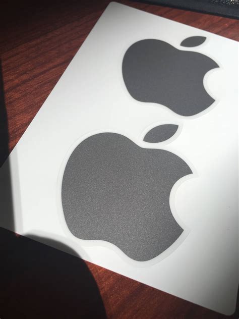 Apple updated their in-box Apple logo stickers : r/apple