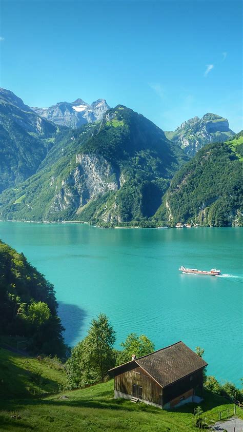 View of Lake Lucerne by mountains and blue sky, Switzerland | Windows ...