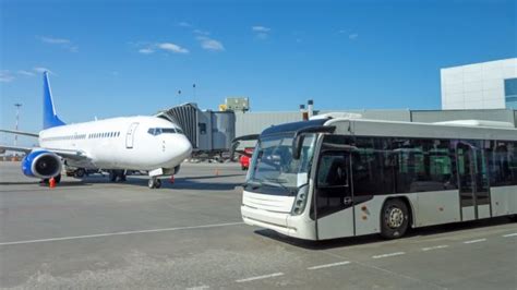 Why some airports use buses to transport passengers to planes