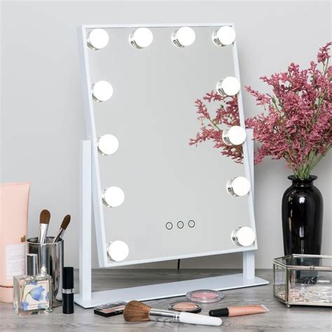 LED LIGHTED VANITY MIRROR: Surrounded by adjustable LED lights to ...