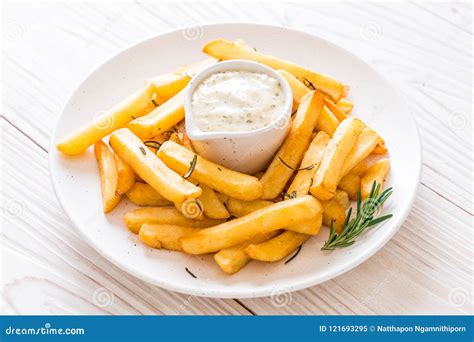 French fries with sauce stock image. Image of golden - 121693295