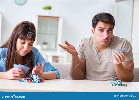 The Young Family Playing Cards at Home Stock Image - Image of fortune, girlfriend: 115335287