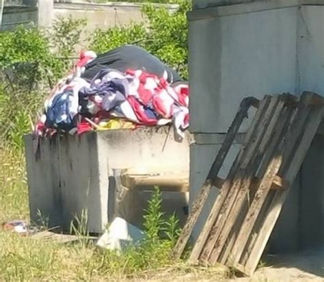 Pile of American flags found in garbage at RI veterans cemetery - The ...