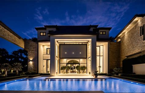 Premium AI Image | Photo of a luxurious house with a stunning swimming pool