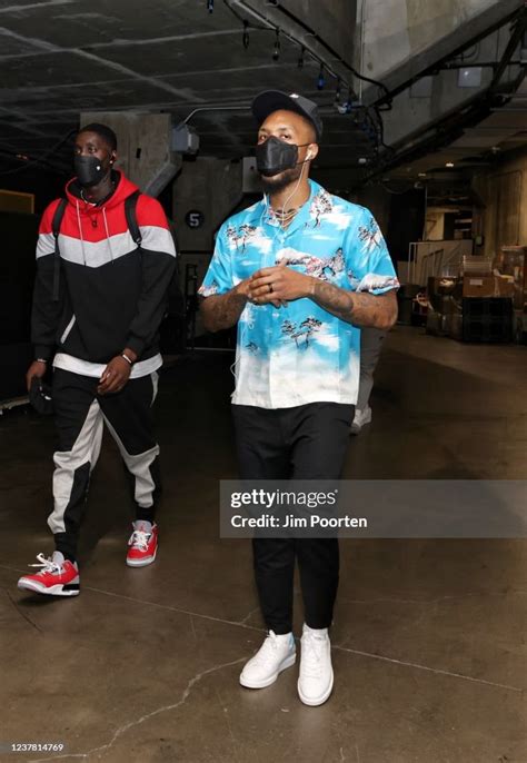 Tony Snell and Damian Lillard of the Portland Trail Blazers arrives... News Photo - Getty Images