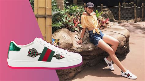 nettamente uragano logo celebrities wearing gucci ace sneakers acciaio ...