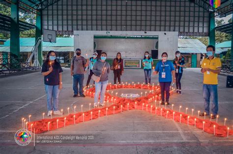 International AIDS Candlelight Memorial – We remember – We take action – We live beyond HIV