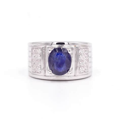 Diamond silver ring with blue stone 2438215 Stock Photo at Vecteezy