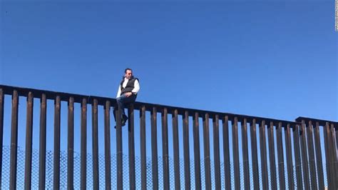 Mexican lawmaker climbs border wall in stunt aimed at US President ...