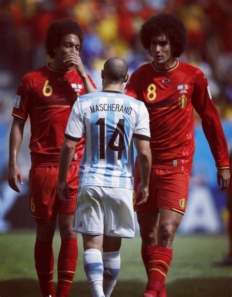 Javier Mascherano (Argentina) facing up Witsel and Fellaini (Belgium ...