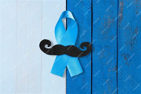 Premium Photo | November prostate cancer awareness month. blue ribbon with a mustache. healthcare