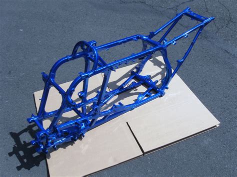 Powder coated motorcycle frame in a blue metallic sparkle. See our gallery here: http ...