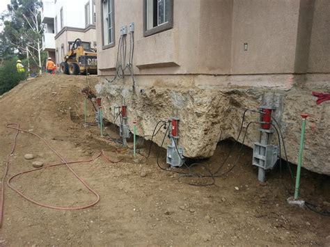 Foundation Repair - The Missions at Rio Vista Apartment Buildings - Piers in place