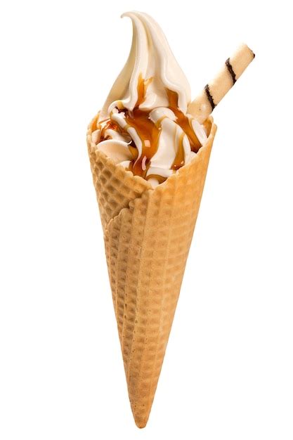 Vanilla ice cream and caramel sauce in cone | Premium Photo