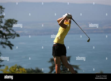 Lady golf swing Stock Photo - Alamy