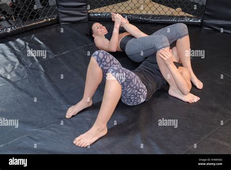 2 women wrestling Stock Photo - Alamy