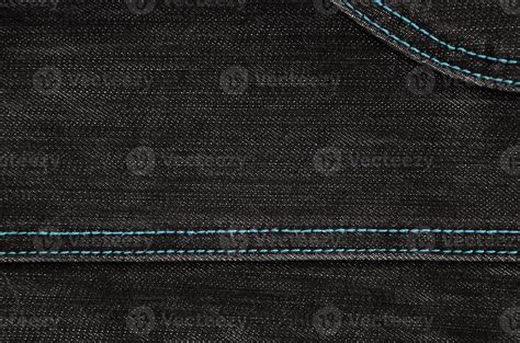 The texture of black denim cloth 12368775 Stock Photo at Vecteezy