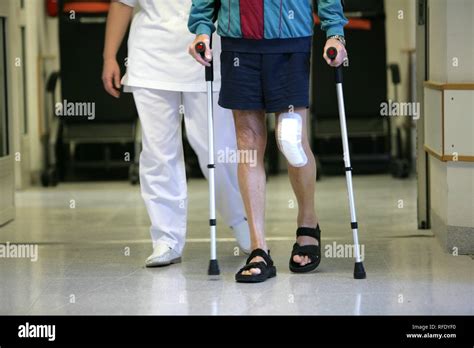 Hospital, physiotherapy after knee surgery Stock Photo - Alamy