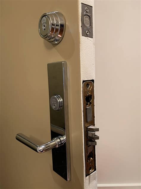 How to completely remove Falcon door lock - Home Improvement Stack Exchange