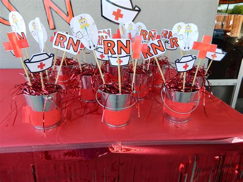 RN Party Center Pieces | Nursing graduation party, Nurse party, Nurse graduation party decorations