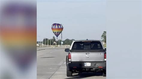 3 seriously injured after hot air balloon strikes power lines, crashes ...