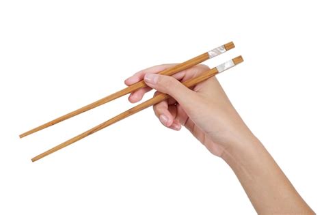 Premium Photo | Woman hand holding chopsticks isolated on white