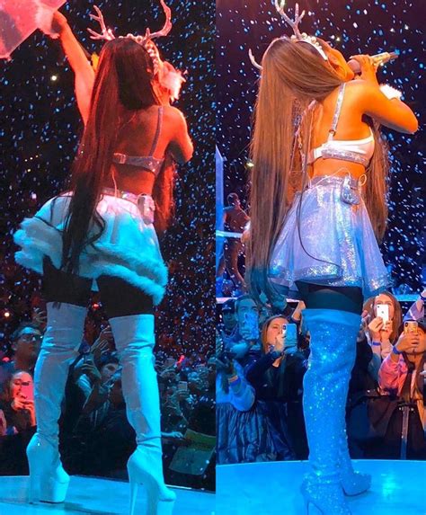 two women in costumes on stage with confetti falling from their mouths and hands