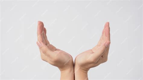 Premium Photo | Empty hand doing carryd gesture on white background.