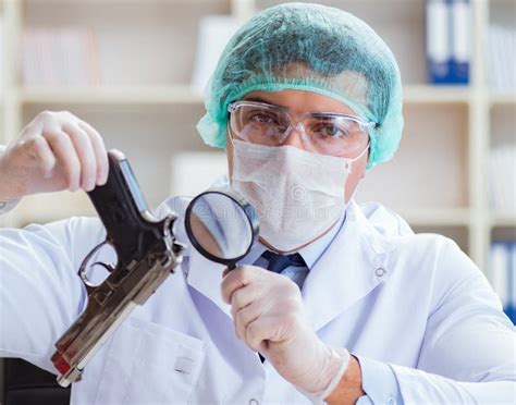 Forensics Investigator Working in Lab on Crime Evidence Stock Photo - Image of investigator ...