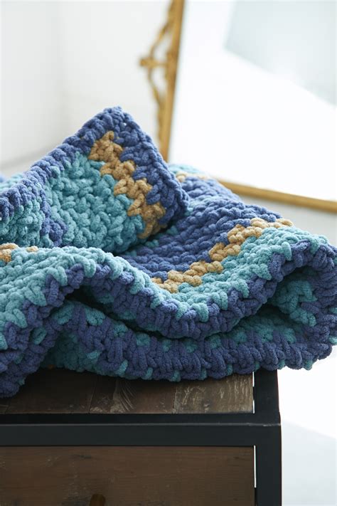 Bernat Cozy Up Stripes Blanket | Crochet blanket yarn, Chunky crochet ...