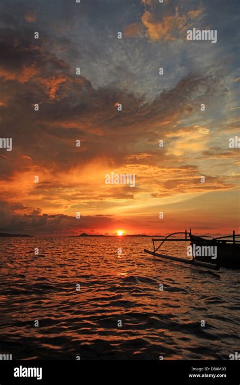 sunset on Bangka Island, North Sulawesi, Indonesia Stock Photo - Alamy